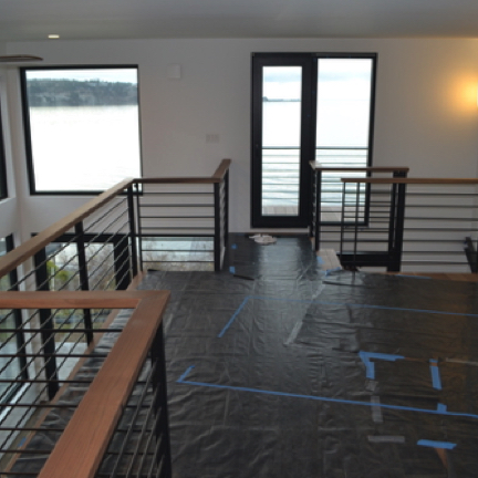 Mezzanine with walnut truck decking and railing.